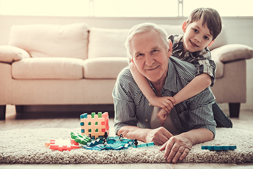 Grandfather playing with his grandson